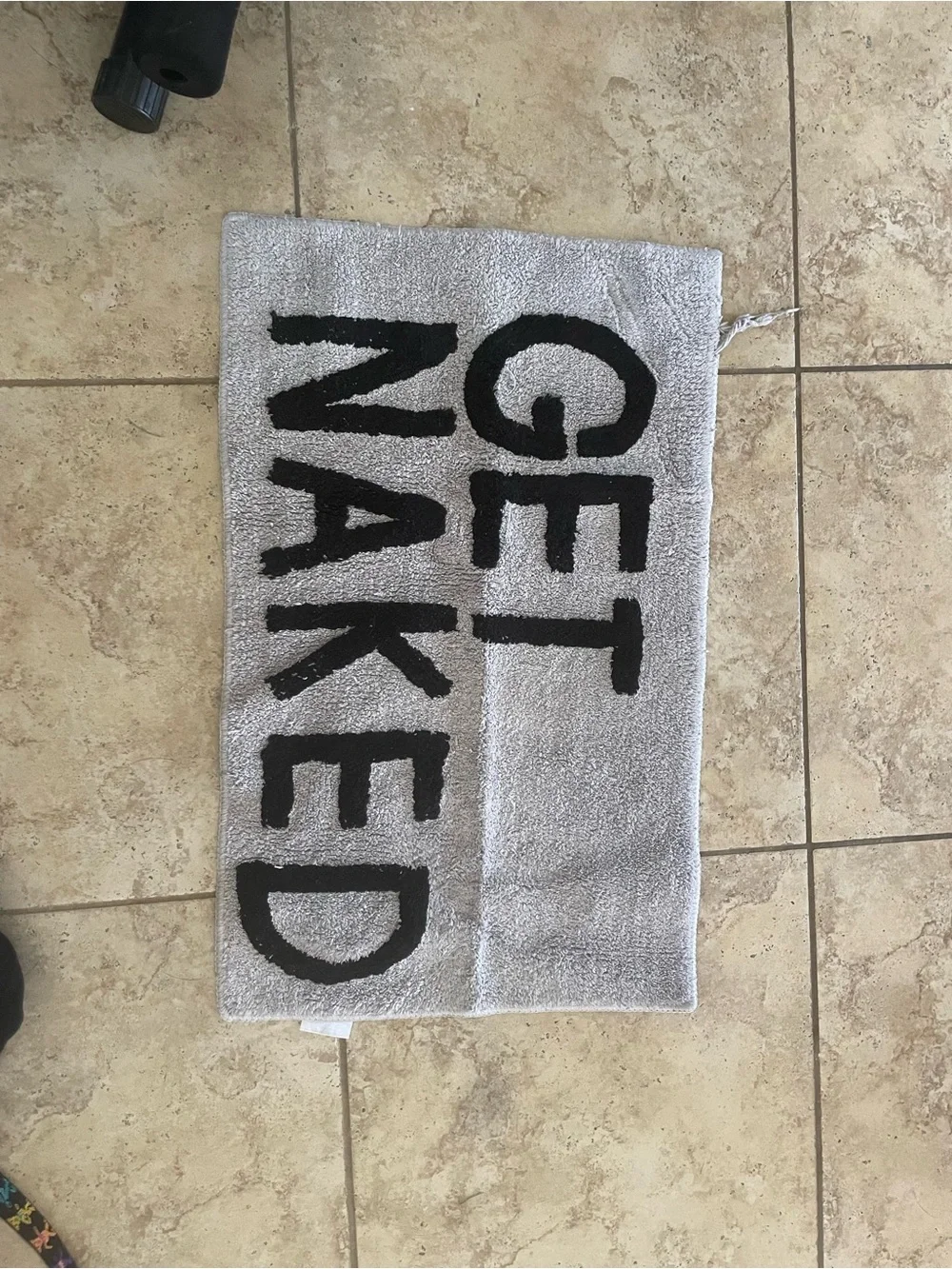 “GET NAKED” Gray Textured Bath Mat with Care Label
